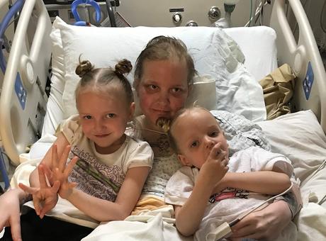 Picture of Alayla in hospital with two children 